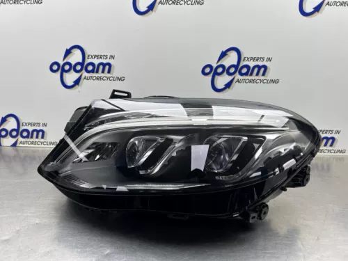 Koplamp links-
