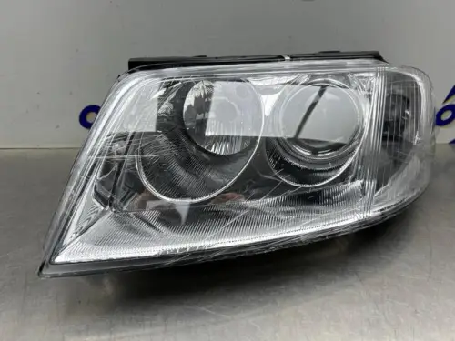 Koplamp links-